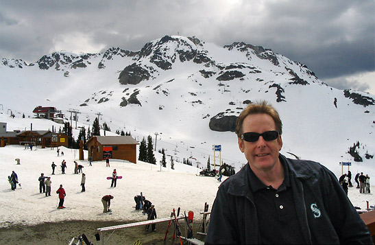 the writer at the ski resort of Whistler Blackcomb with the Coast Mountains in the background, Whistler, B.C.