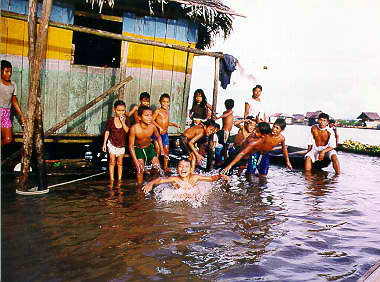 Children playing in the Amazon