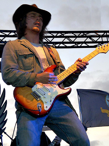 POTR guitarist Lukas Nelson performing onstage