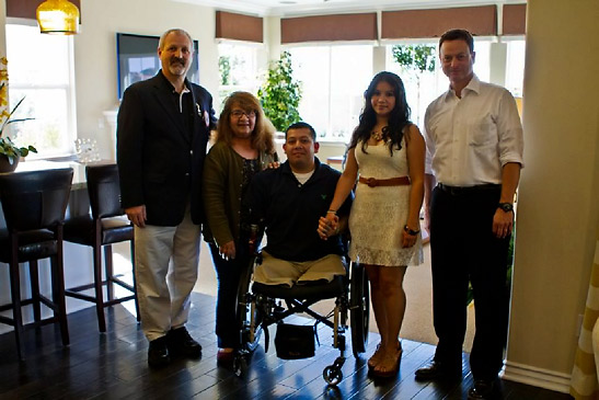 Cpl. Juan Dominguez with his family, Fred Siller and Gary Sinise