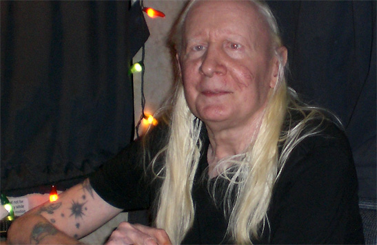 Johnny Winter relaxing before a concert