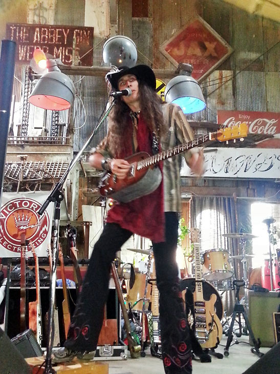 Johnson performing with his 'tub' guitar at the Juke Joint Chapel