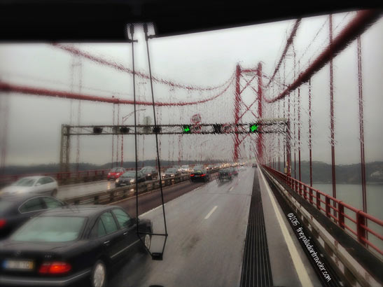 crossing the Ponte 25 de Abril (25th of April Bridge) over the Tagus River, Portugal