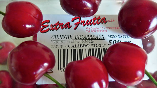 Bigarreaux cherries and plastic container