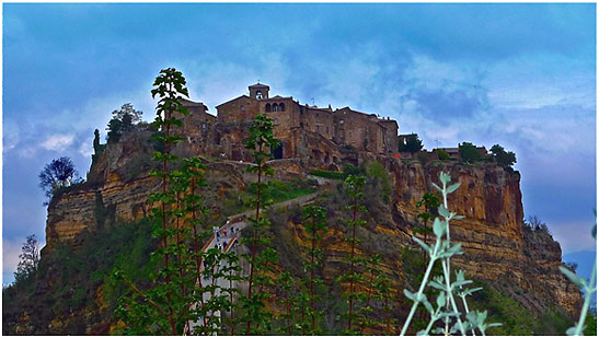 a closer look at Civita di Bagnoregio atop a volcanic tuff