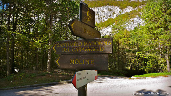 signpost pointing to The Sanctuary of Our Lady of Carravaggio, Deggia, northern Italy