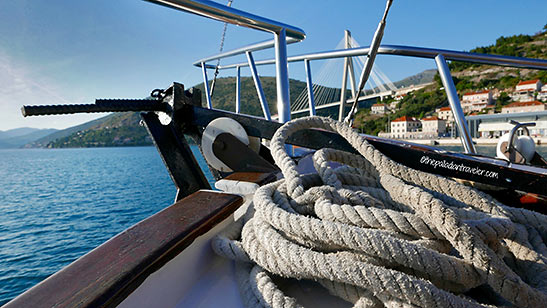 aboard a private sightseeing boat for a scenic cruise around Dubrovnik harbor