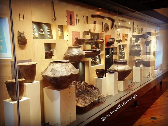 a collection of potteries and other artifacts at the Fiave museum