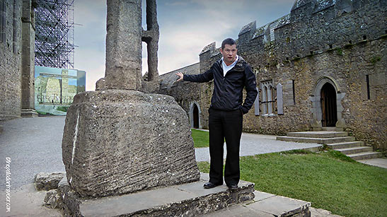 museum curator David at a stone replica of the Cross of St. Patrick
