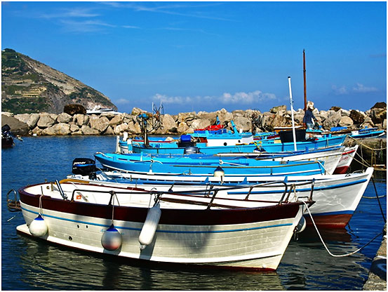 a row of fishing boats at San Angelo, Ischia