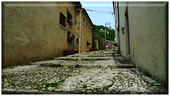 ancient cobblestone walkway up one of Piovene Rocchette's passageways