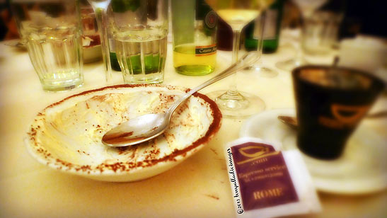 the writer's empty bowl and wine glasses at the Ristorante 4 Colonne
