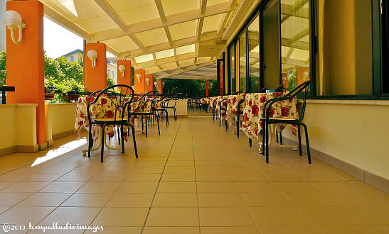 dining area at Hotel Turistico's wrap-around veranda