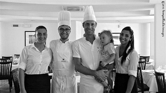 Chef Santini and his crew (with child) at the Hotel Turistico