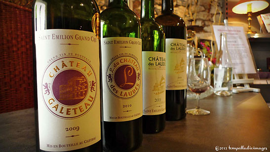 row of wine bottles for wine-tasting, Chateau des Laudes , Saint-Emilion