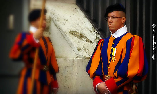 Pontifical Swiss Guards, standing vigil in their traditional Renaissance era uniforms