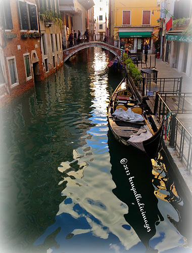 gondola parked along a waterway, Venice